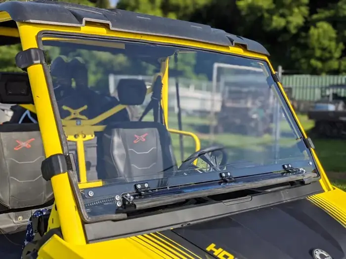 A glass windshield fitted to a side-by-side at the TMT Offroad shop in Williston, FL
